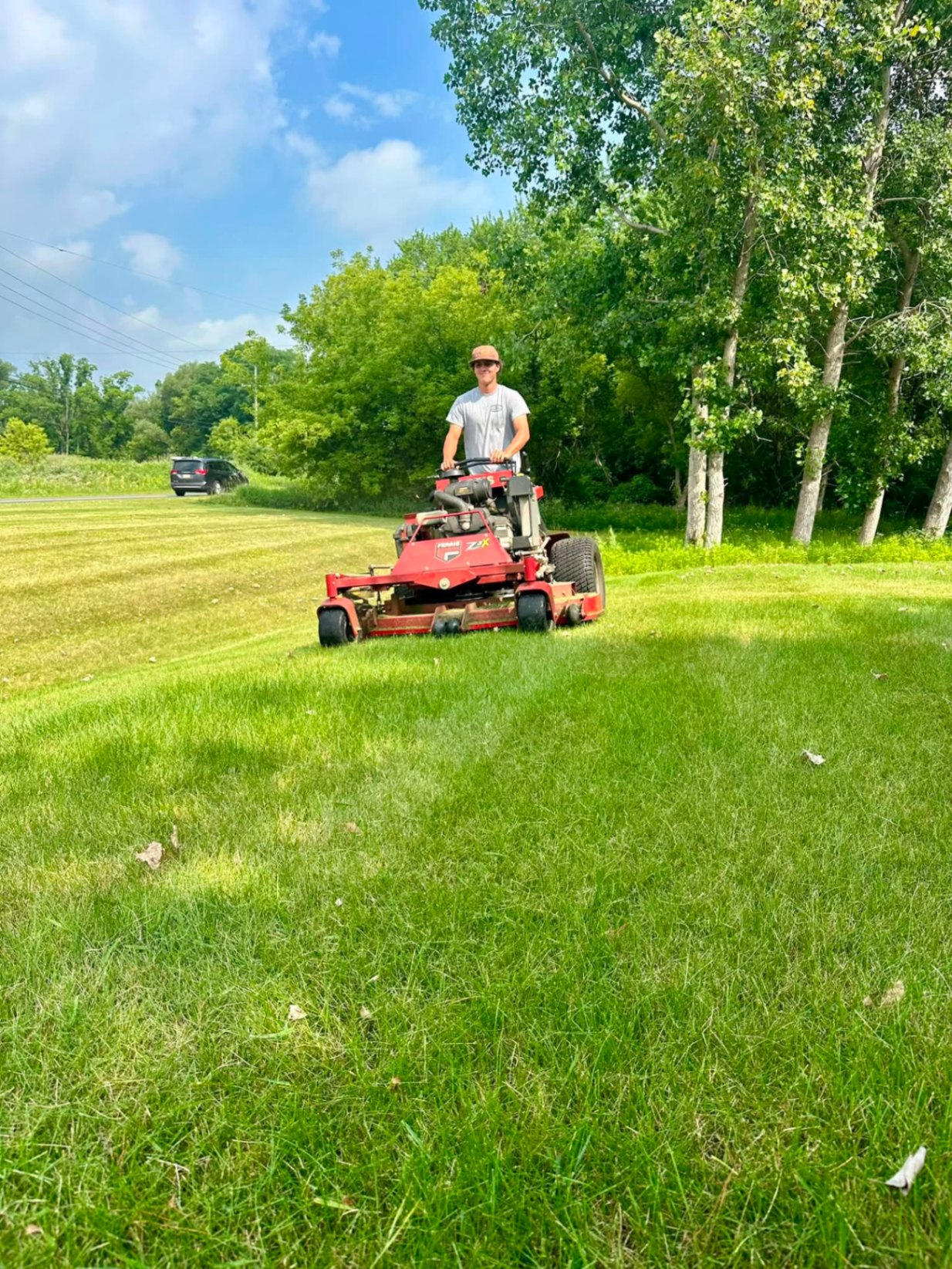Stand-on mower in action